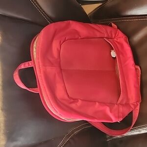 GENTLY USED RED BACKPACK W LOTS OF POCKETS